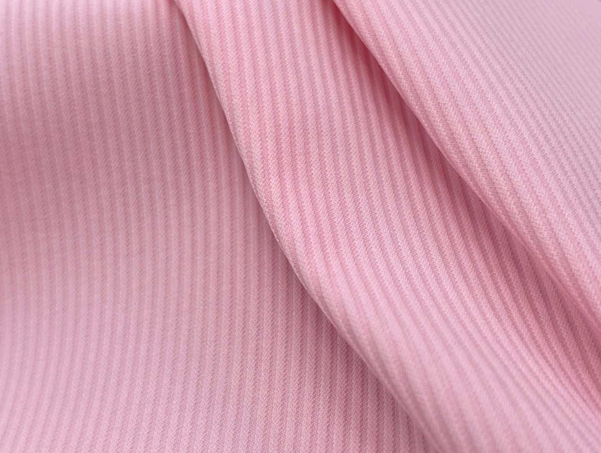 Synthetic woven fabrics